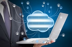 close-up-of-businessman-hand-holding-laptop-with-a-2025-10-15-05-54-06-utc