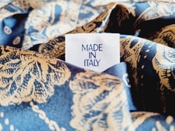 closeup-of-a-made-in-italy-label-on-a-blue-foula-2025-02-02-21-18-40-utc