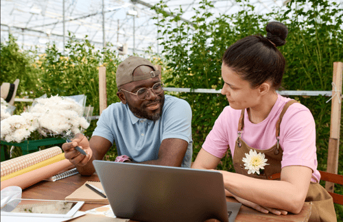 garden center employees at computer