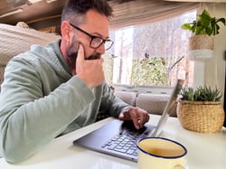 man-working-inside-a-camper-van-in-modern-online-j-2025-03-05-16-52-04-utc