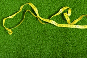 measuring-tape-on-the-grass-2023-11-27-05-31-48-utc