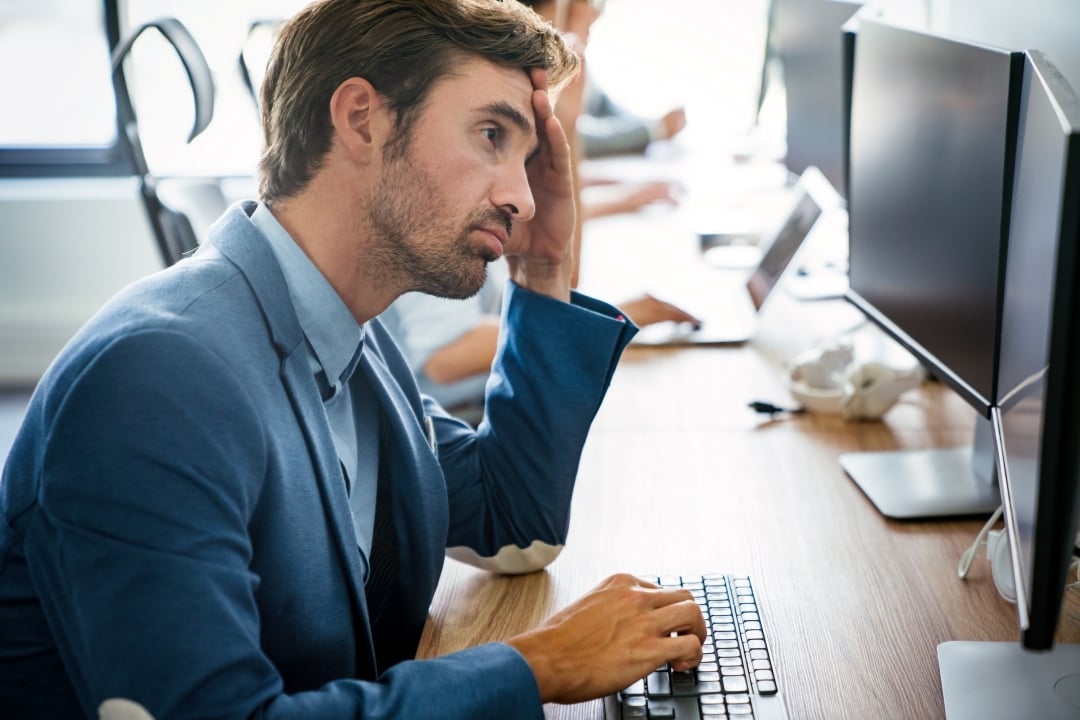 overworked-tired-employee-at-workplace-in-office-b-2025-03-14-12-52-50-utc