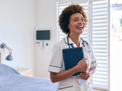 portrait-of-smiling-female-nurse-wearing-uniform-w-2024-10-19-21-36-53-utc