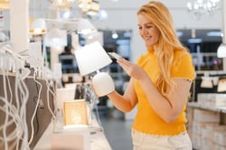 blog.windwardsoftware.comhubfssmiling-pretty-woman-choosing-lamp-and-looking-at-2025-02-20-10-11-42-utc-1