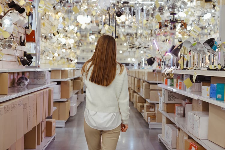 young-woman-at-lamp-store-choosing-chandelier-ba-2025-02-12-23-00-09-utc-1