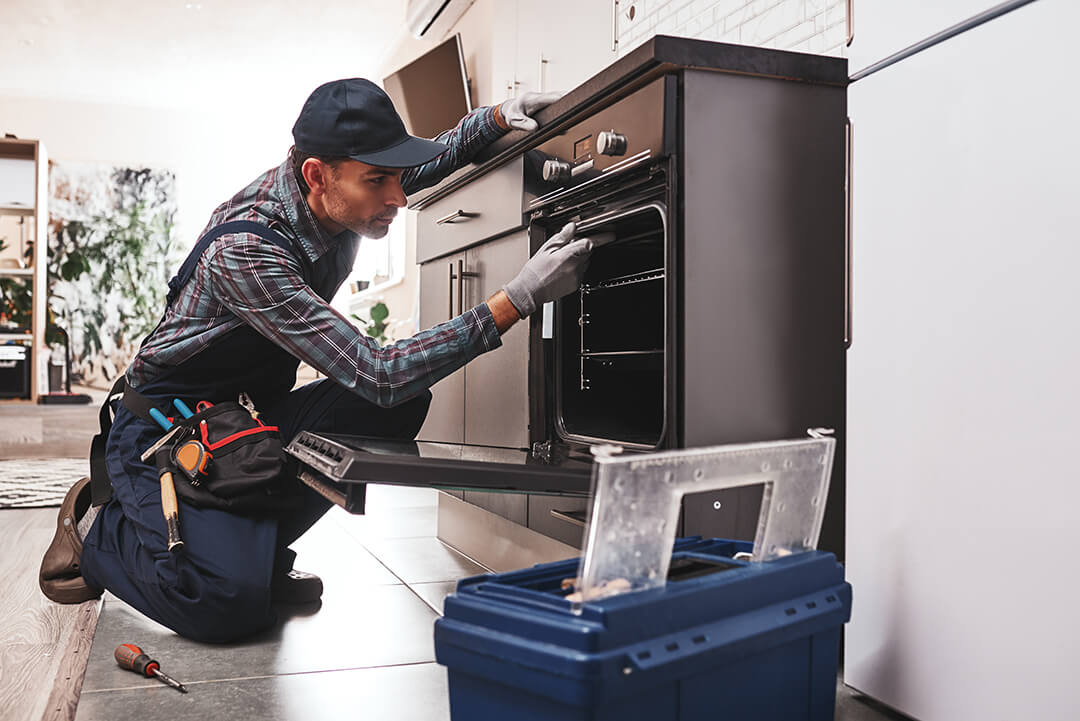 close-up-of-repairman-appliance